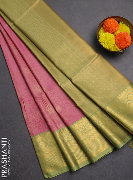 Semi soft silk saree pink and green with allover zari weaves and zari woven border