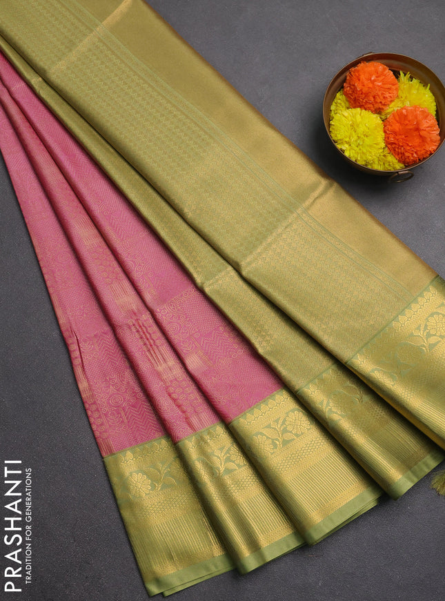 Semi soft silk saree pink and green with allover zari weaves and zari woven border