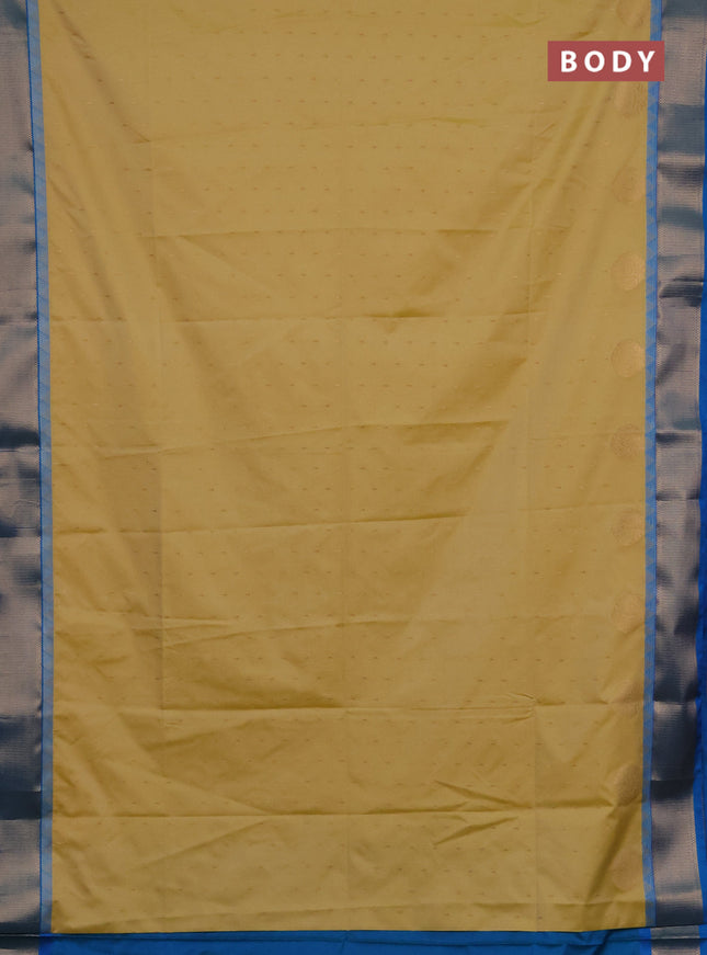 Semi soft silk saree pale yellow and cs blue with allover zari woven buttas and zari woven border
