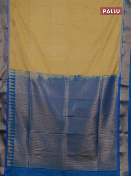 Semi soft silk saree pale yellow and cs blue with allover zari woven buttas and zari woven border