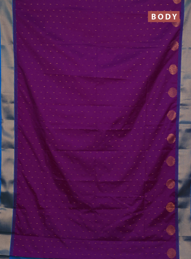 Semi soft silk saree purple and teal blue with allover zari woven buttas and zari woven border