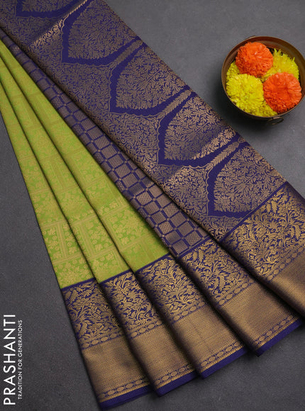 Semi soft silk saree green and pink navy blue with allover zari checked pattern and ganga jamuna border