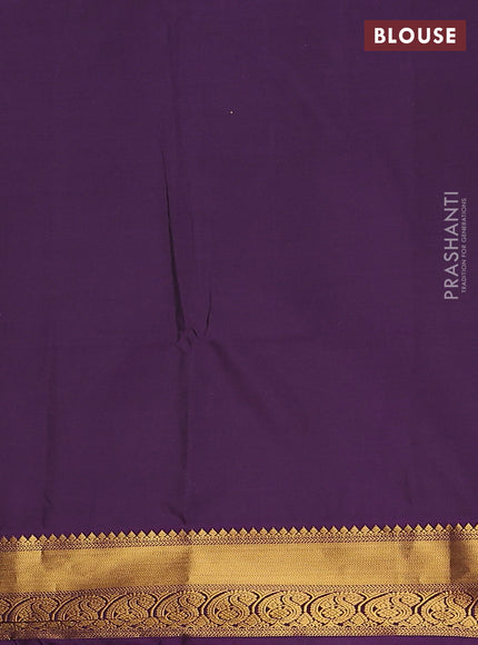 Semi soft silk saree green and purple with allover silver & gold zari woven buttas and zari woven border