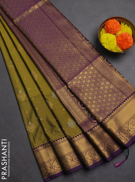 Semi soft silk saree mehendi green and purple with allover silver & gold zari woven buttas and zari woven border