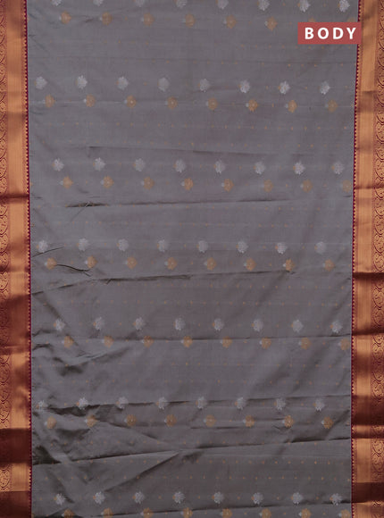 Semi soft silk saree grey and dark magenta pink with allover silver & gold zari woven buttas and zari woven border