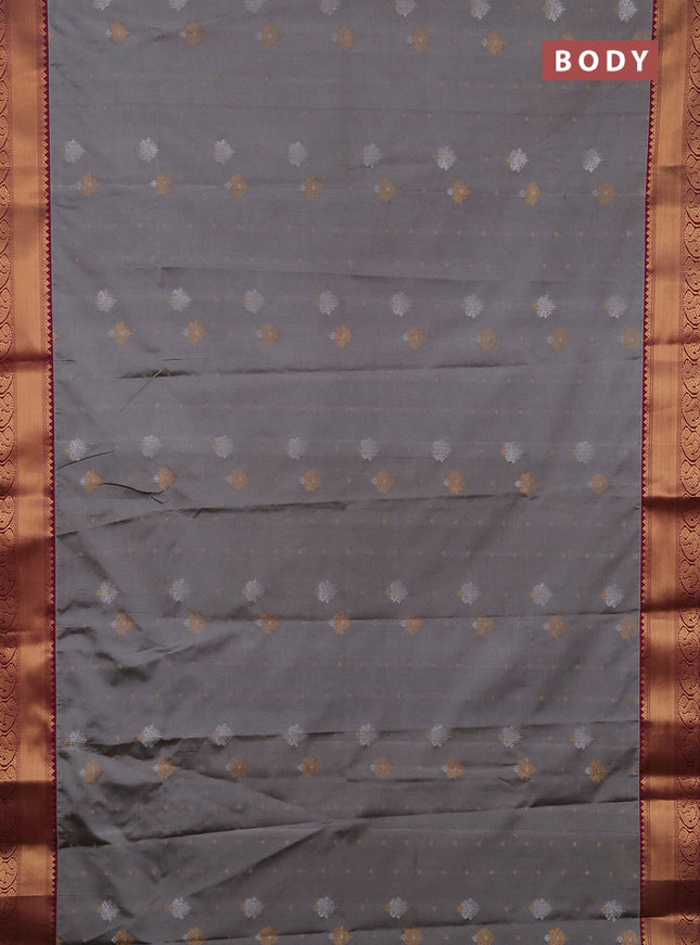 Semi soft silk saree grey and dark magenta pink with allover silver & gold zari woven buttas and zari woven border