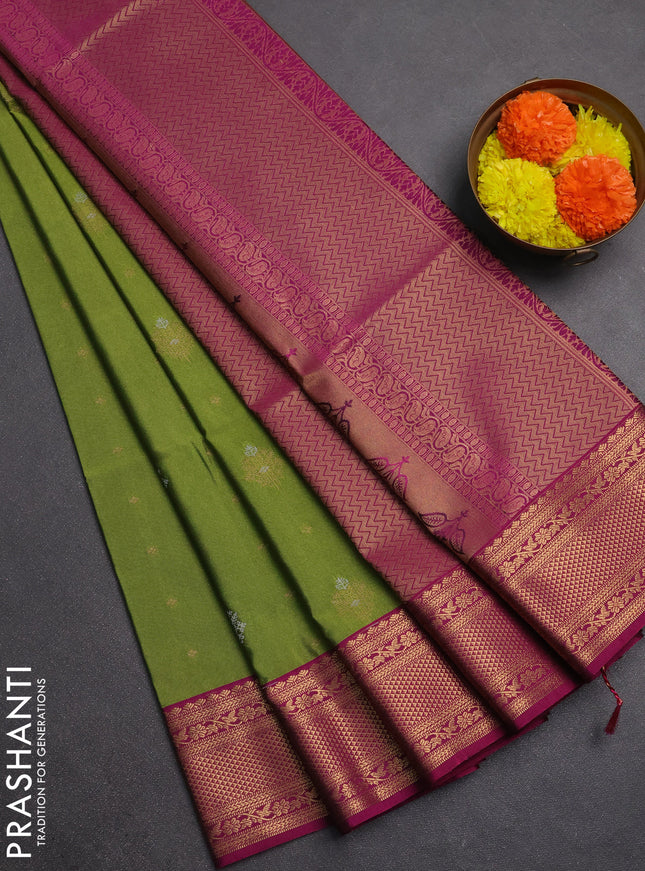 Semi soft silk saree green and dark magenta pink with allover silver & gold zari woven buttas and zari woven border