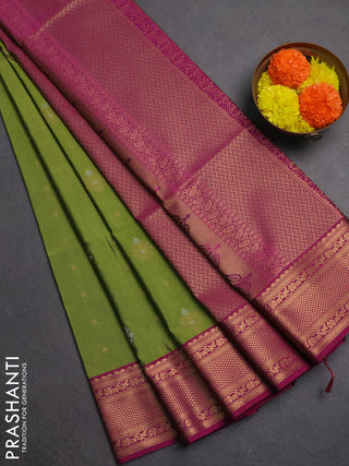 Semi soft silk saree green and dark magenta pink with allover silver & gold zari woven buttas and zari woven border