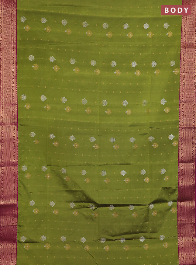 Semi soft silk saree green and dark magenta pink with allover silver & gold zari woven buttas and zari woven border