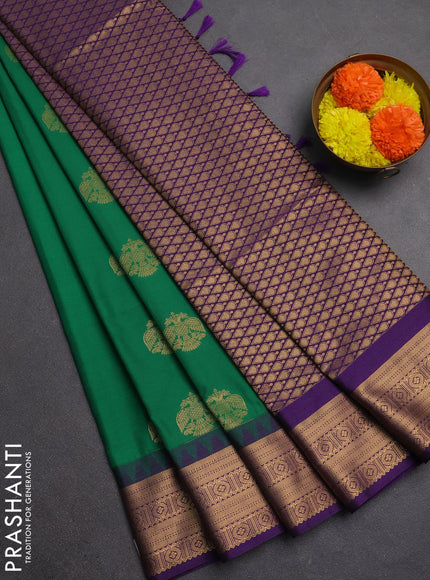 Semi soft silk saree green and purple with zari woven buttas and temple design zari woven border