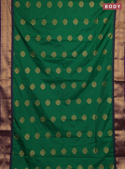 Semi soft silk saree green and purple with zari woven buttas and temple design zari woven border
