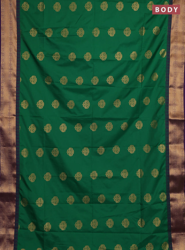 Semi soft silk saree green and purple with zari woven buttas and temple design zari woven border