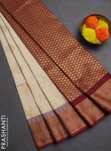 Semi soft silk saree cream and maroon with zari woven buttas and temple design zari woven border
