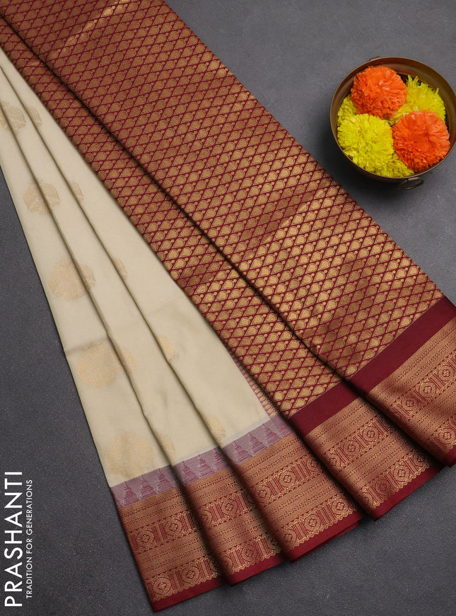 Semi soft silk saree cream and maroon with zari woven buttas and temple design zari woven border