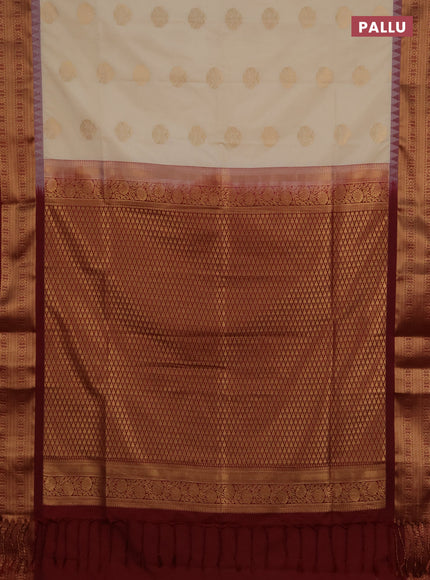 Semi soft silk saree cream and maroon with zari woven buttas and temple design zari woven border