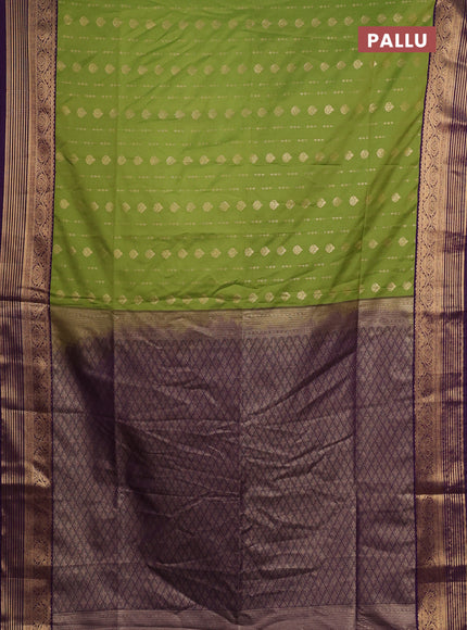 Semi soft silk saree green and purple with allover zari woven buttas and zari woven border