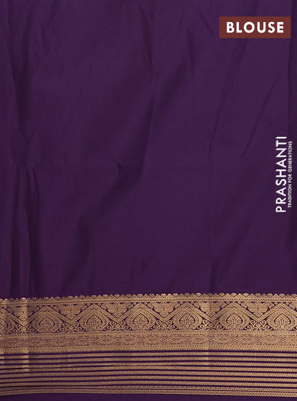 Semi soft silk saree green and purple with allover zari woven buttas and zari woven border