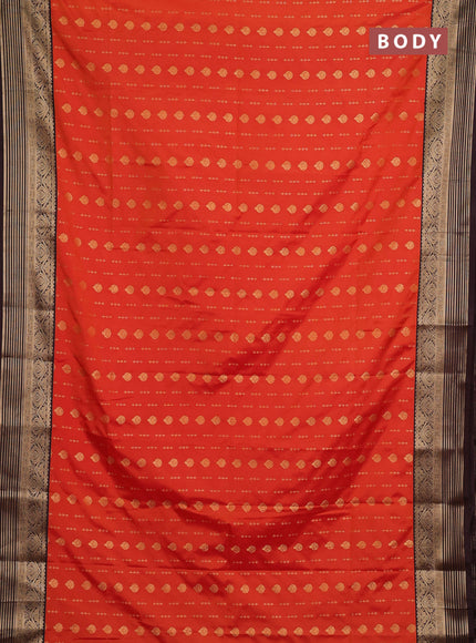 Semi soft silk saree orange and coffee brown with allover zari woven buttas and zari woven border