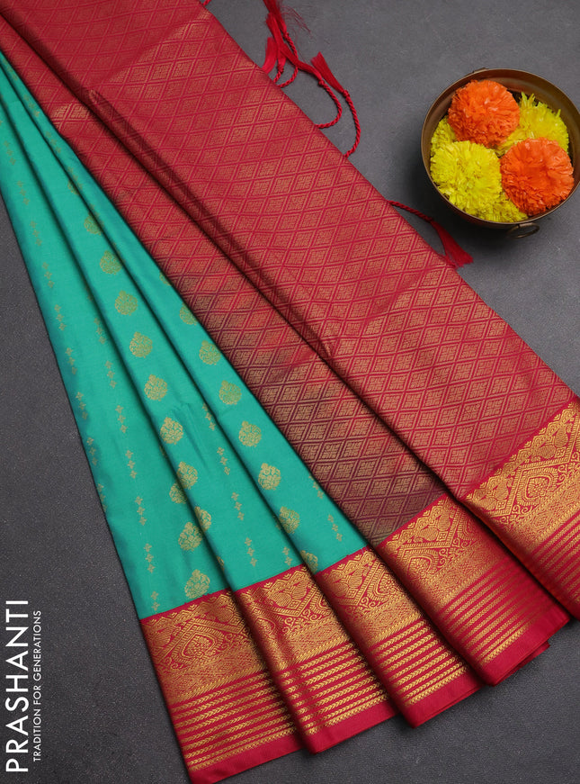 Semi soft silk saree teal green and pink with allover zari woven buttas and zari woven border