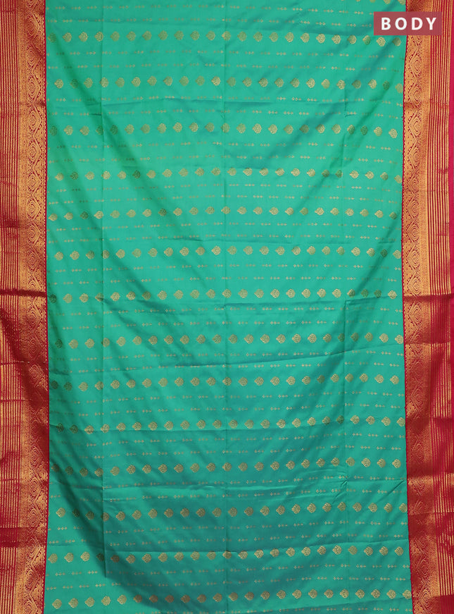 Semi soft silk saree teal green and pink with allover zari woven buttas and zari woven border