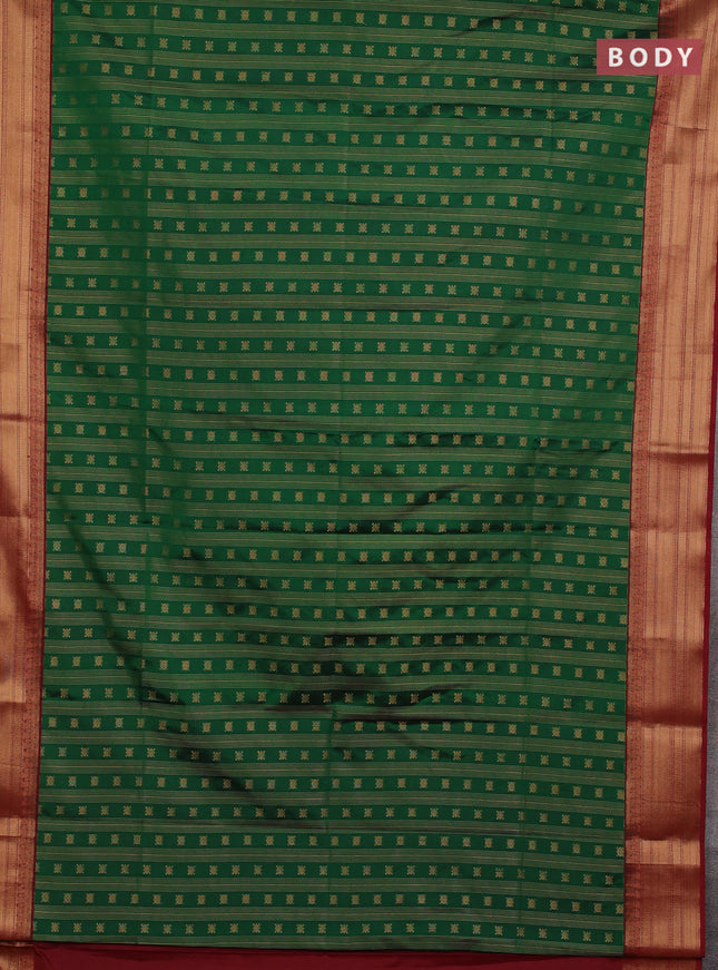 Semi soft silk saree green and maroon with allover zari weaves & buttas and zari woven border