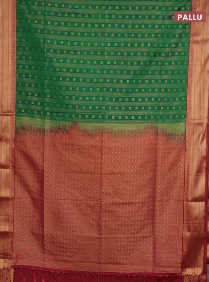 Semi soft silk saree green and maroon with allover zari weaves & buttas and zari woven border