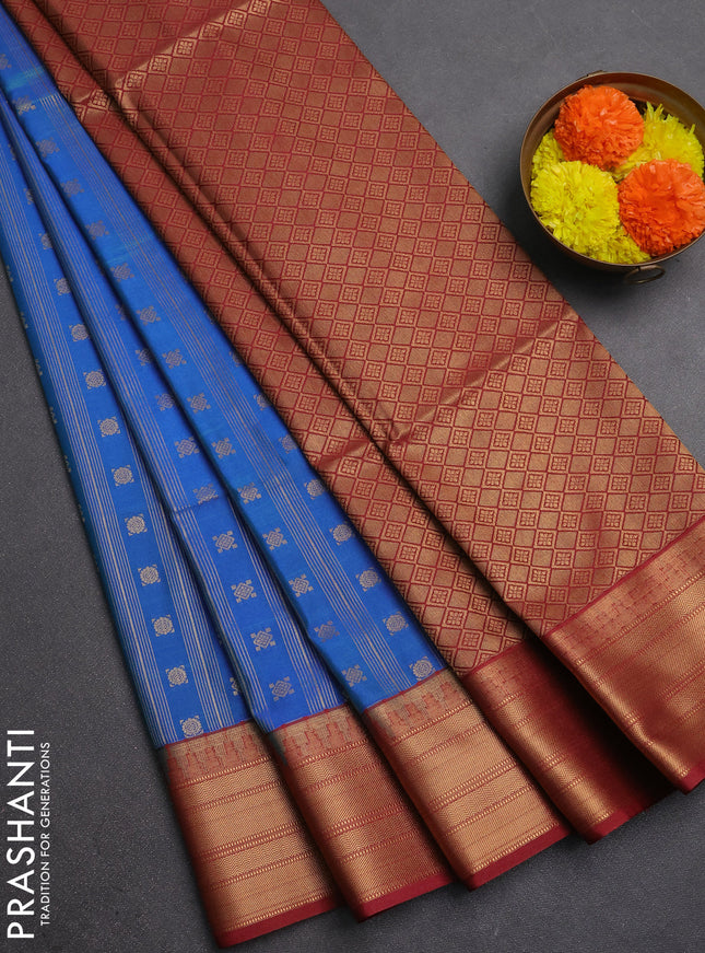 Semi soft silk saree cs blue and maroon with allover zari weaves & buttas and zari woven border
