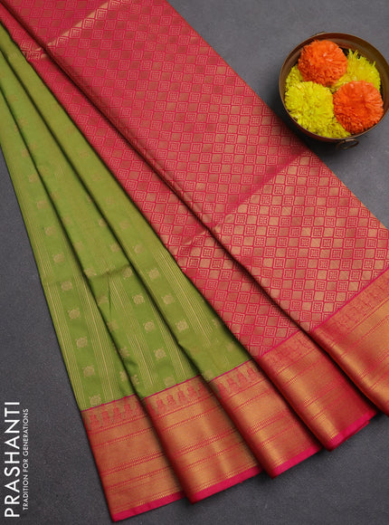 Semi soft silk saree green and pink with allover zari weaves & buttas and zari woven border