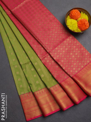 Semi soft silk saree green and pink with allover zari weaves & buttas and zari woven border