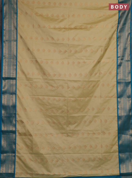Semi soft silk saree beige and teal blue with zari woven butta border and zari woven border