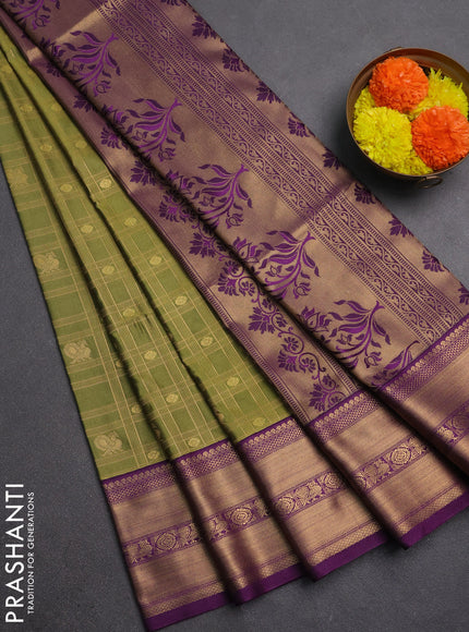 Semi soft silk saree green and purple with allover zari checks & buttas and zari woven border
