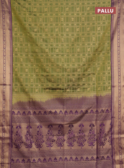 Semi soft silk saree green and purple with allover zari checks & buttas and zari woven border