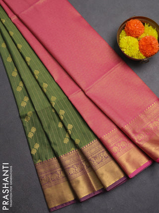 Semi soft silk saree green and mauve pink with allover zari weaves & buttas and rich zari woven border