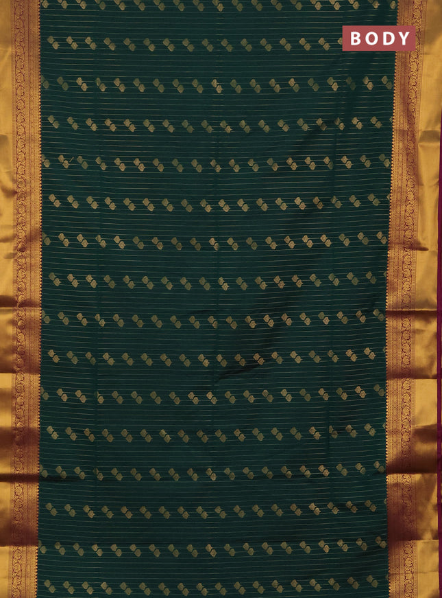 Semi soft silk saree bottle green and magenta pink with allover zari weaves & buttas and rich zari woven border
