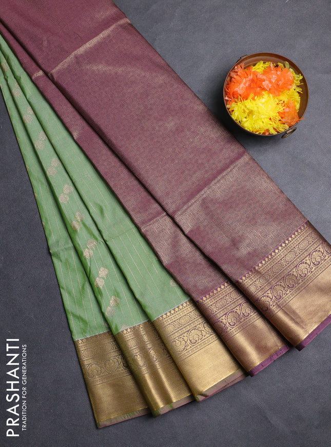 Semi soft silk saree mild pista green and dual shade of pink shade with allover zari weaves & buttas and rich zari woven border