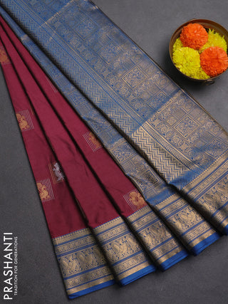 Semi soft silk saree wine shade and cs blue with zari woven buttas and zari woven border