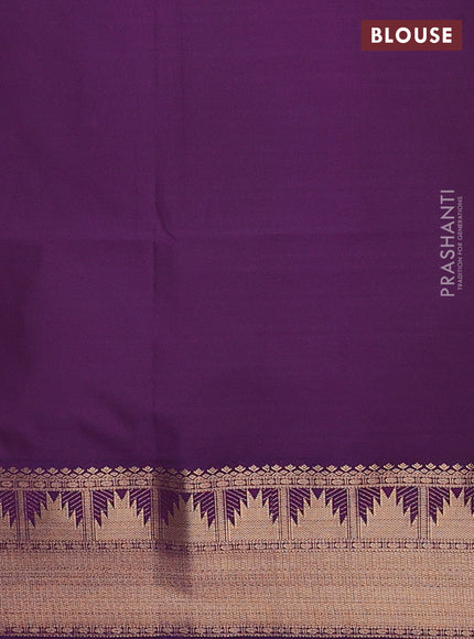 Semi soft silk saree elachi green and purple with allover zari woven buttas and zari woven border