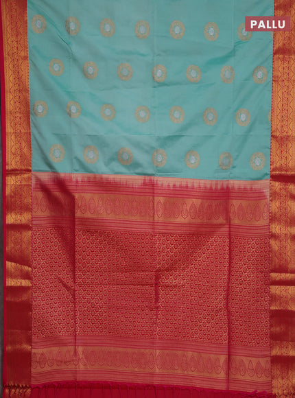 Semi soft silk saree teal blue and pink with allover zari woven buttas and zari woven border