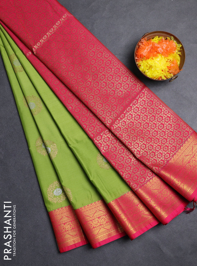 Semi soft silk saree light green and pink with allover zari woven buttas and zari woven border
