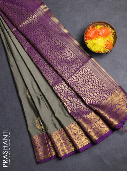 Semi soft silk saree olive green and purple with allover zari woven buttas and zari woven border