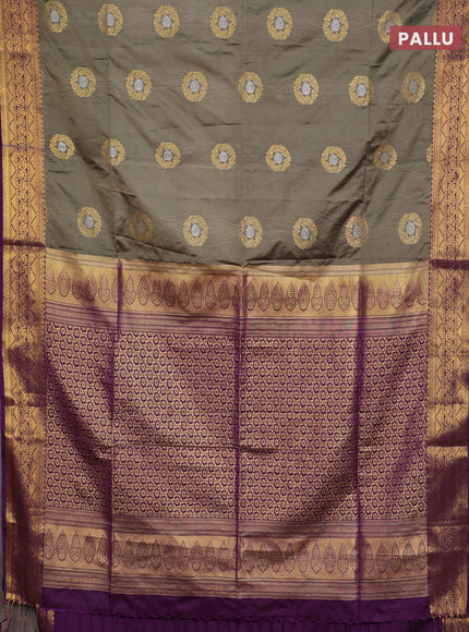 Semi soft silk saree olive green and purple with allover zari woven buttas and zari woven border