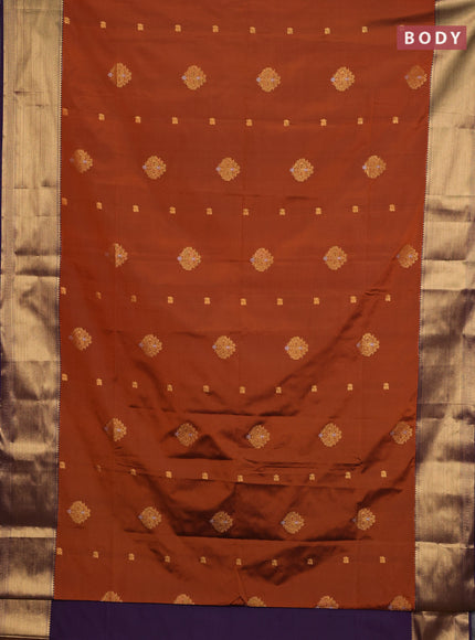 Semi soft silk saree rust shade and purple with allover zari woven buttas and zari woven border