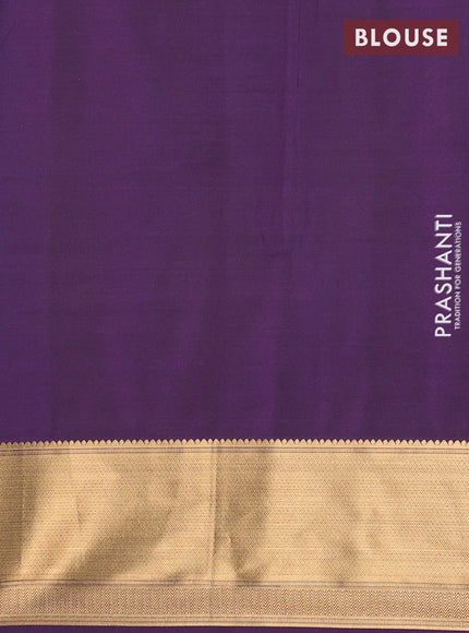Semi soft silk saree rust shade and purple with allover zari woven buttas and zari woven border