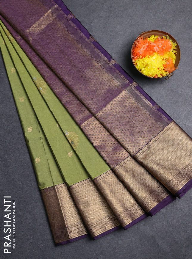 Semi soft silk saree mehendi green and purple with allover zari woven buttas and zari woven border