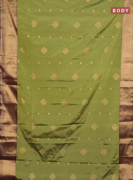 Semi soft silk saree mehendi green and purple with allover zari woven buttas and zari woven border