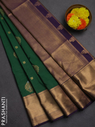Semi soft silk saree dark green and purple with allover zari woven buttas and zari woven border