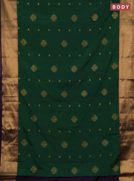 Semi soft silk saree dark green and purple with allover zari woven buttas and zari woven border