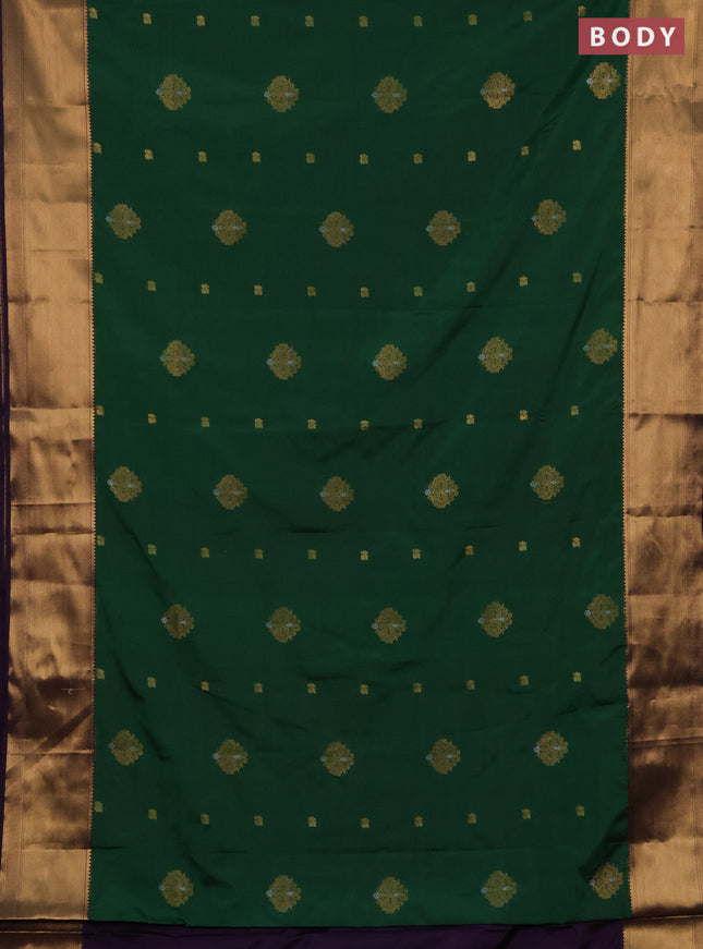 Semi soft silk saree dark green and purple with allover zari woven buttas and zari woven border