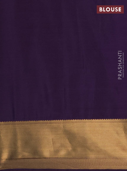 Semi soft silk saree dark green and purple with allover zari woven buttas and zari woven border