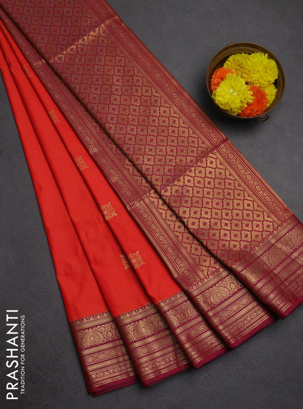 Semi soft silk saree orange and purple with allover zari woven buttas and zari woven border